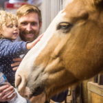 Blake Hoogeveen with his daughter at YIP